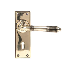 Load image into Gallery viewer, 33040 Aged Brass Reeded Lever Lock Set