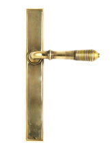 Load image into Gallery viewer, 45419 Aged Brass Reeded Slimline Lever Latch Set