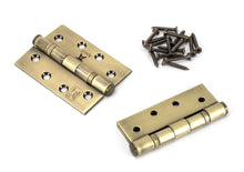 Load image into Gallery viewer, 49570 Aged Brass 4" Ball Bearing Butt Hinge (pair) ss