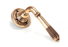 Load image into Gallery viewer, 50090 Polished Bronze Reeded Lever on Rose Set - Unsprung