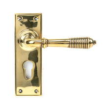 Load image into Gallery viewer, 33085 Aged Brass Reeded Lever Euro Lock Set
