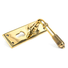 Load image into Gallery viewer, 33085 Aged Brass Reeded Lever Euro Lock Set
