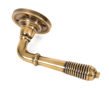 Load image into Gallery viewer, 50086 Aged Brass Reeded Lever on Rose Set - Unsprung
