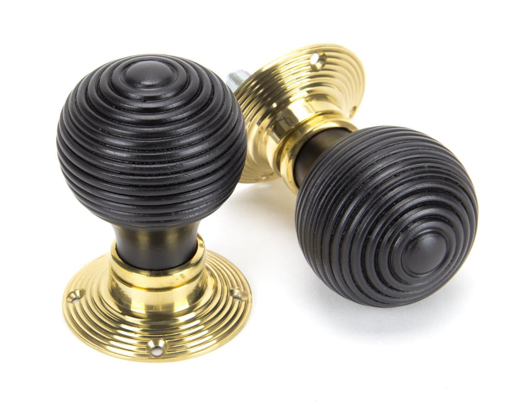 91729 Ebony & Polished Brass Beehive Mortice/Rim Knob Set